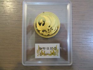 大吉 武蔵小金井店 御即位10万円金貨の画像です。