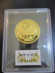 大吉 武蔵小金井店 御即位10万円金貨の画像です。