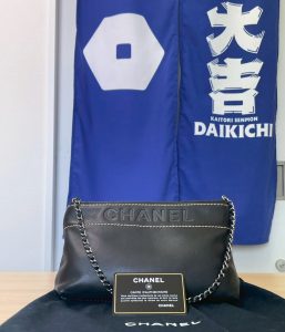 chanel-black-leather-chain-bag-with-card-hiroshima.jpg