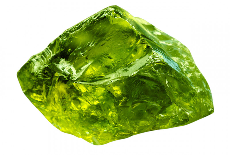 Emerald gem stone mineral. Green gemstone of precious rock isolated on white background. Transparent shiny raw brilliant gem.