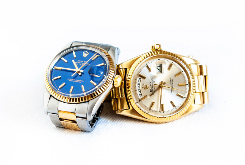 CREMONA, ITALY - MARCH, 2019: Rolex Oyster Perpetual Day- Date and Oyster Blue watch on white background. Rolex SA is an important Swiss luxury company in the production of fine wrist watches, founded in London, England in 1905